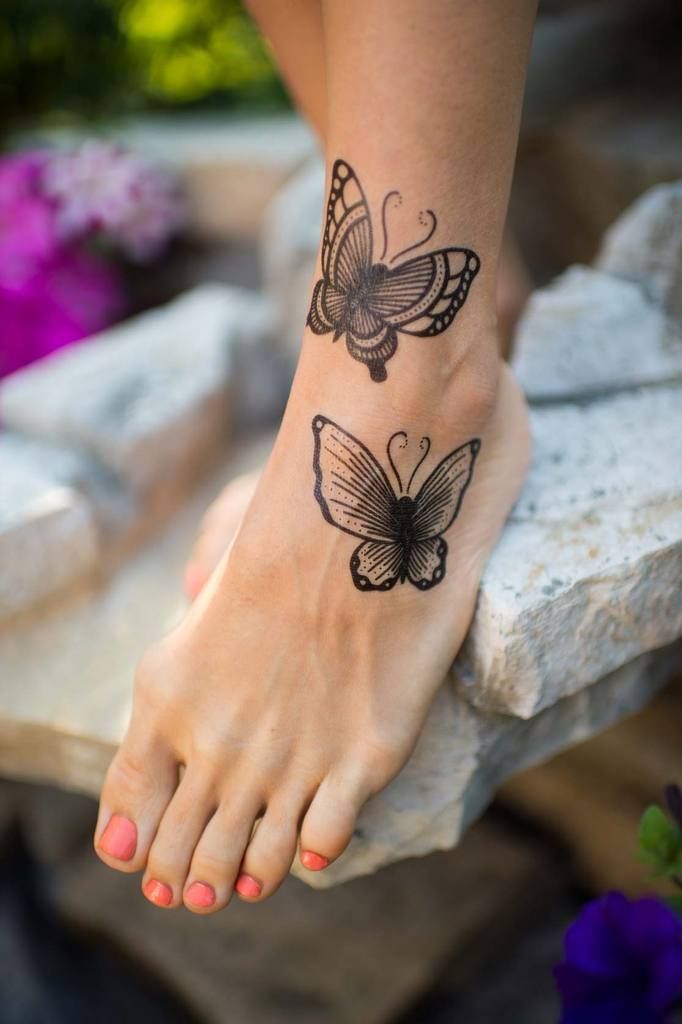 Butterfly on Feet Tattoo
