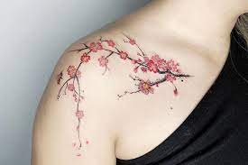 Top Cherry Blossom Tattoos Ideas -30+ Options to Choose From 7 Tattoo of Realistic Watercolor Fruit and Floral on a Woman's Shoulder