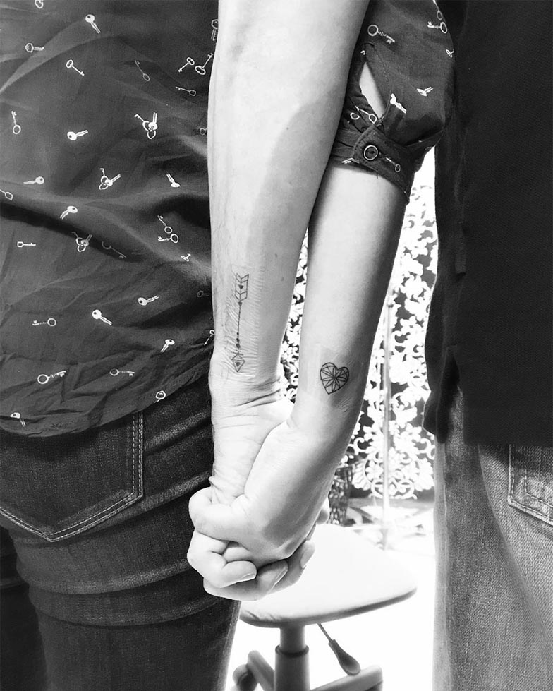 Arrow and heart tattoo for couples