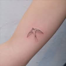 14. Minimalist Sparrow Tattoos