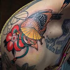 15. Creative Sparrow Tattoos