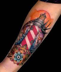 3. Lighthouse and Sparrow Tattoo