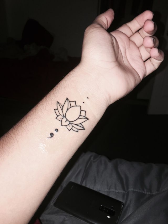 Lotus and a semicolon Tattoo