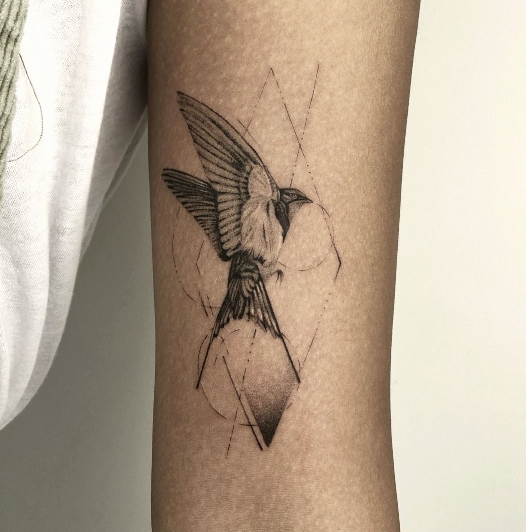 5. Sparrow Inside Geometrical Patterns Tattoo