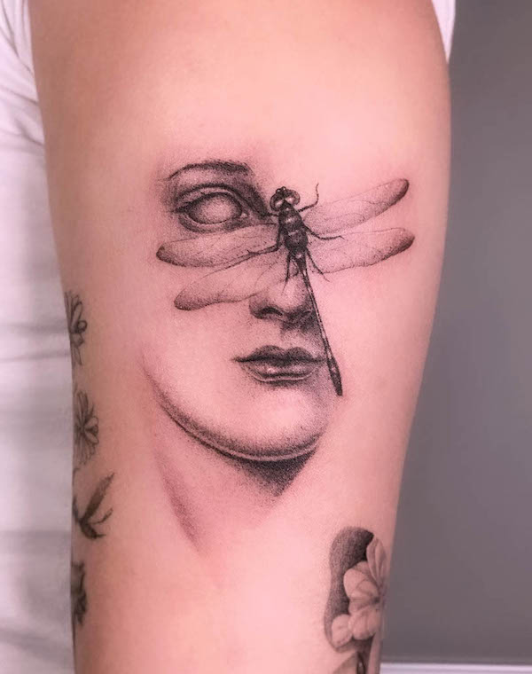 Tattoo with a Dotwork Dragonfly and an Eye Portrait