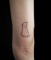 10. Minimalist Dog Tattoo