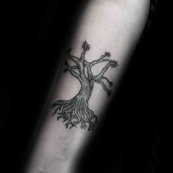 14. TATTOO OF TREE ROOTS