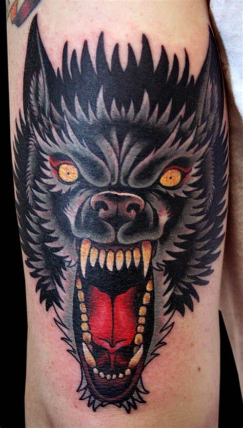 35 Wolf Tattoo Ideas- Inked Predators: The Grace and Strength of Wolf Tattoos 3 Angry Wolf Tattoo