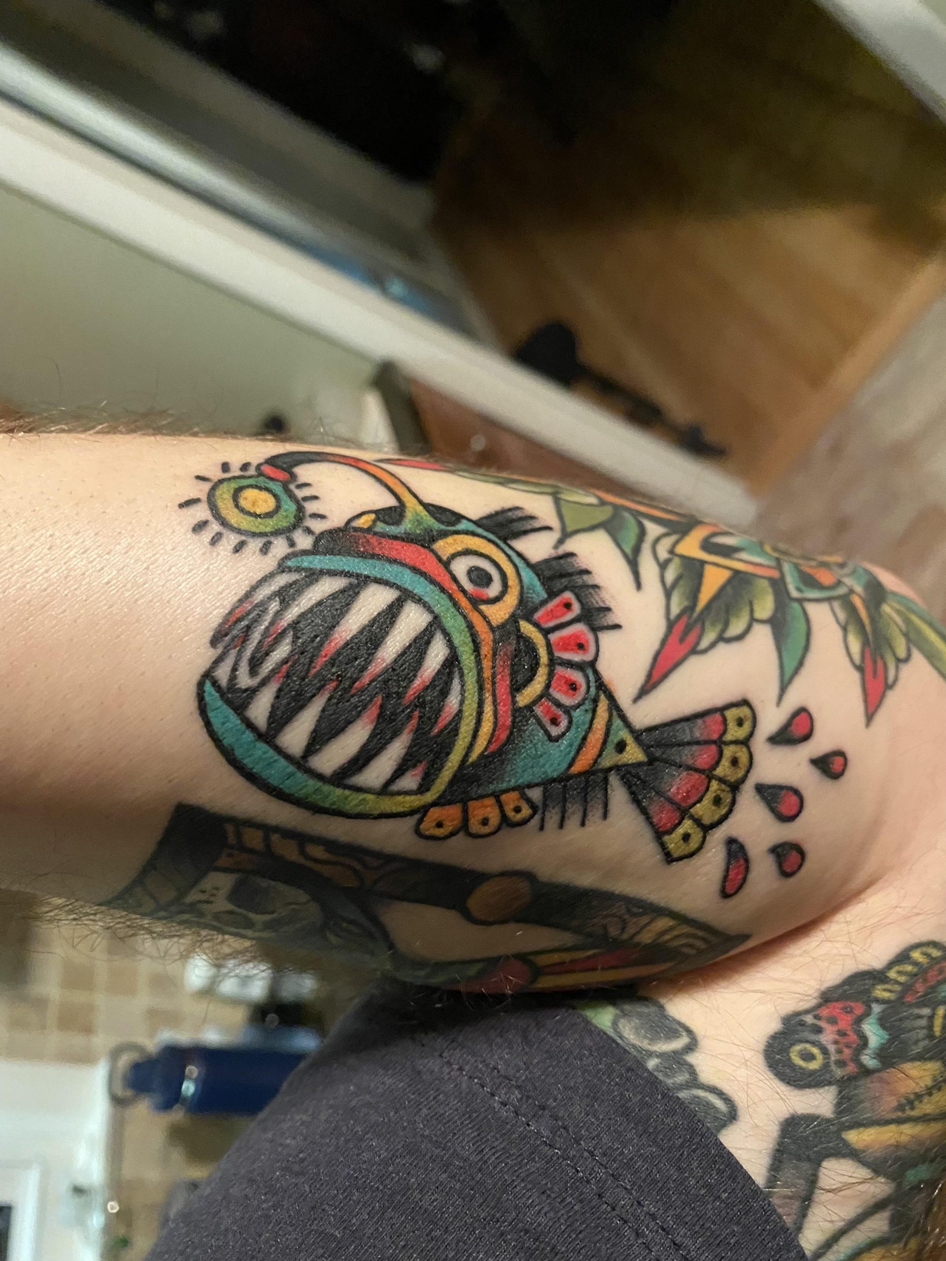 Anglerfish and Plants Tattoo in Neo-Traditional Style