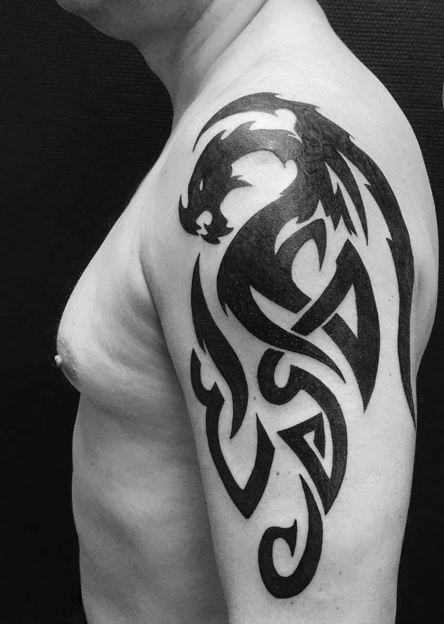 Tattoo of a Tribal Dragon