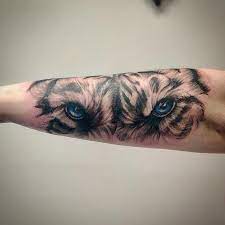 6. TATTOO WITH LION EYES