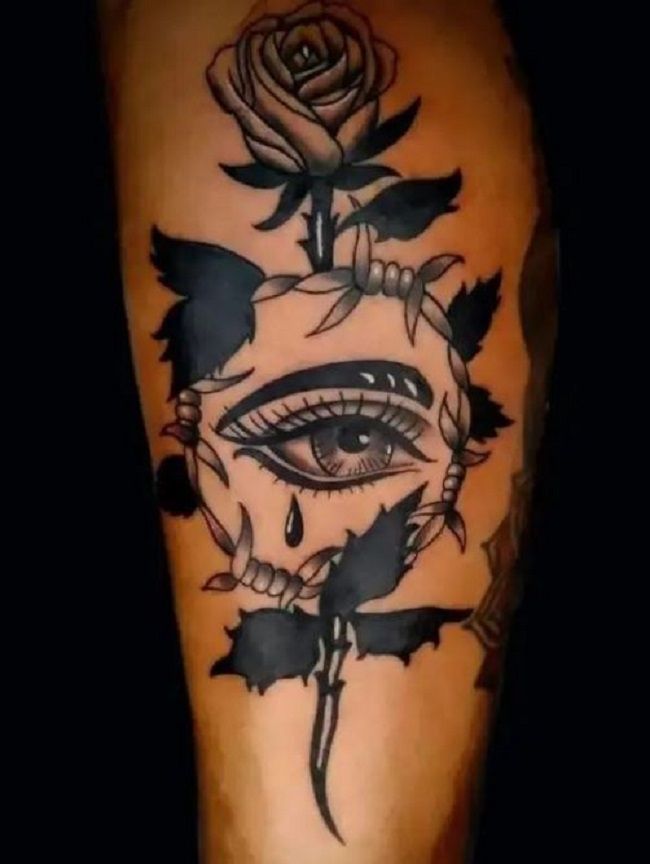 14. Eye Enclosed Between a Barbed-Wire Tattoo