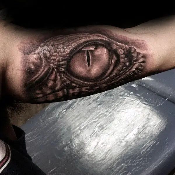 7. Tattoo of Snake Eyes