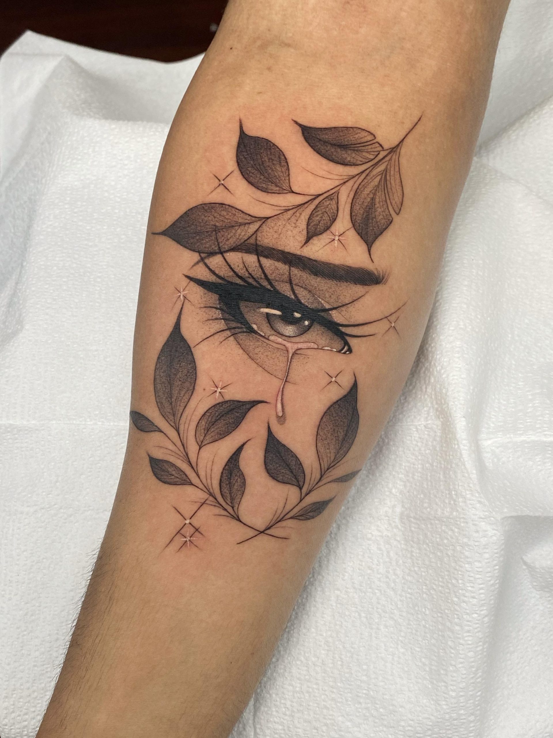 8. Tattoo of a Tearful Eye