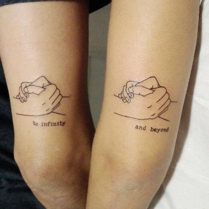 Holding Hand Tattoo