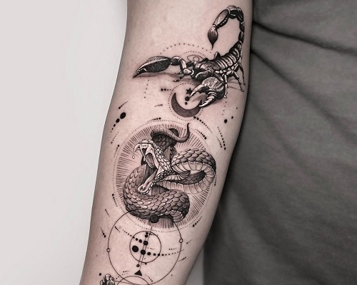 Scorpion Tattoo Designs - 31 Creative Ideas to Inspire You 13 Scorpio Fighting Cobra Arm Tattoo