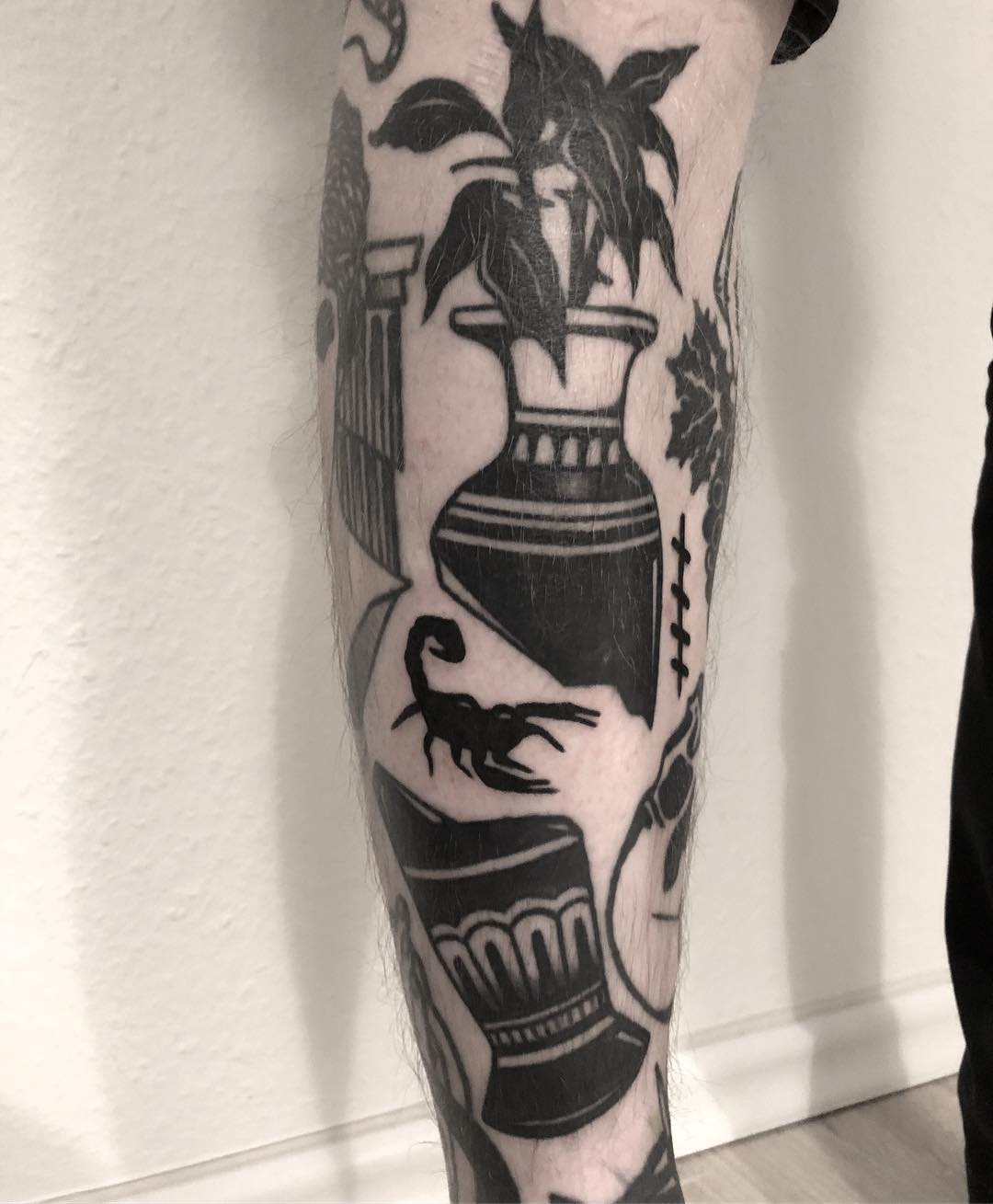 Scorpion in a Vase Tattoo in Black and Gray