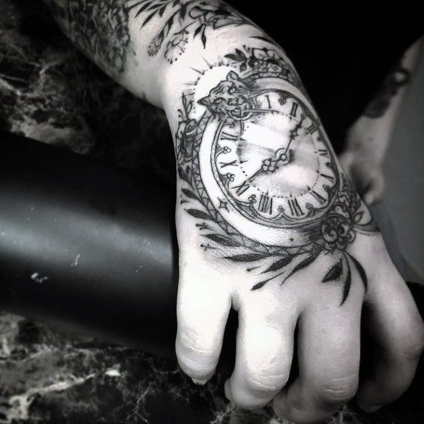 Tattoo of a Clock on Hand