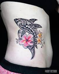 13. Tribal Shark Tattoo With Hawaiian Hibiscus And Plumerias Flowers