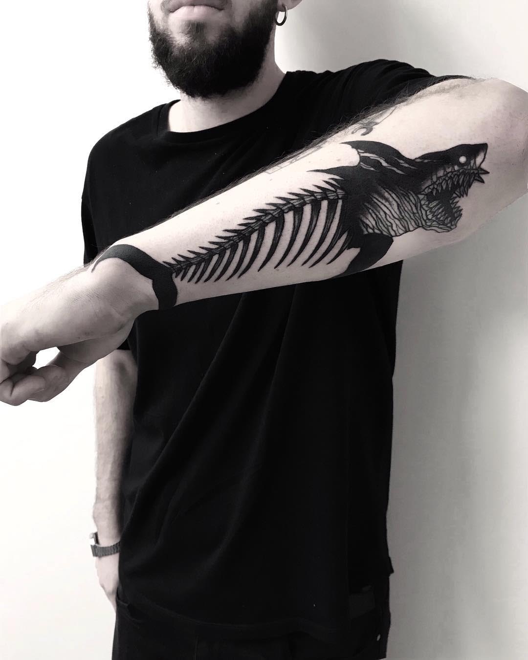 Shark Tattoo Ideas - Symbolizing Authority and Guardianship 16 16. Shark Skeleton Tattoo Design