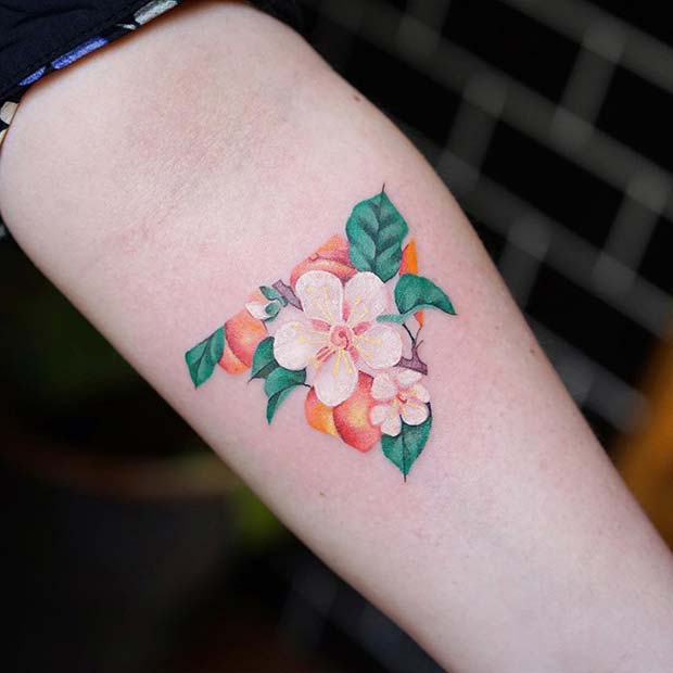 9. Floral Triangle Tattoo