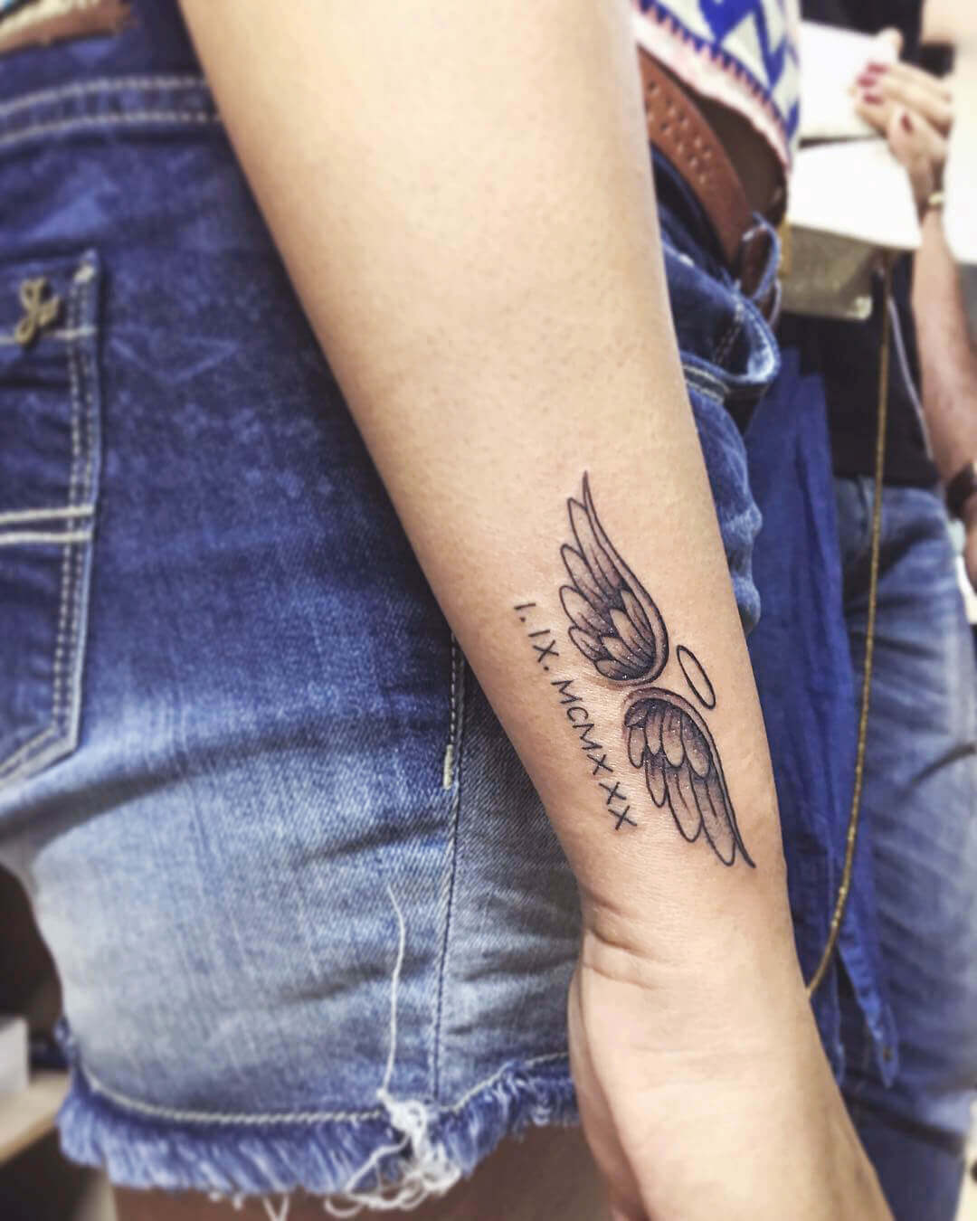 wings tattoo