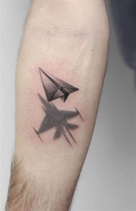 Paper airplane tattoo