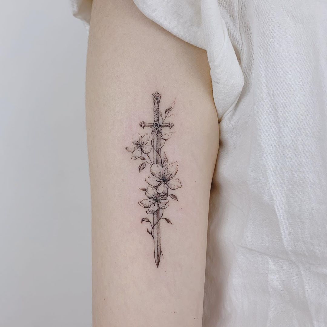 Top 30 Lily Tattoo Ideas Which Are Both Soft core and Powerful 5 Sword Lily tattoo