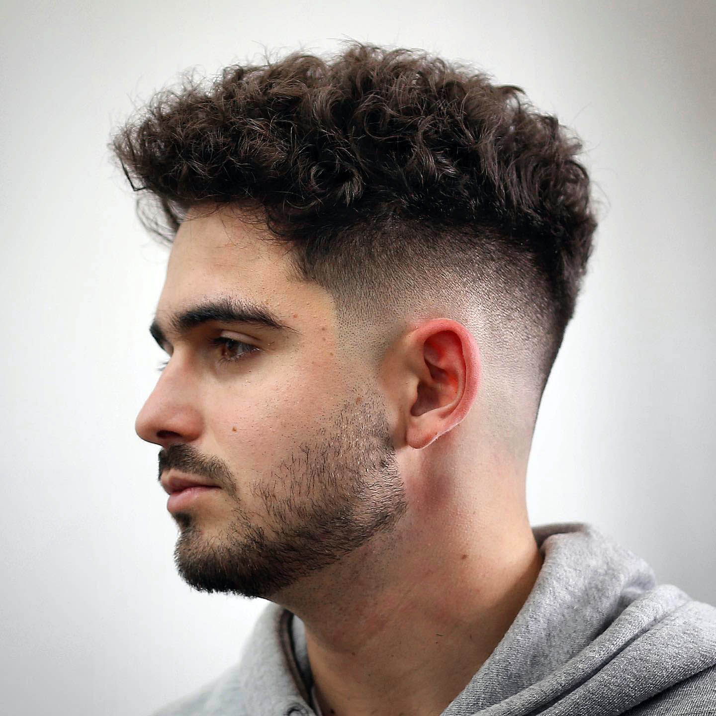 42 Timeless Hairstyles: Inspired by Indian Men 7 Faded Wavy Mohawk