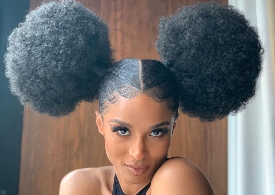 Two Curly Hair Ponytails with a Middle-parting