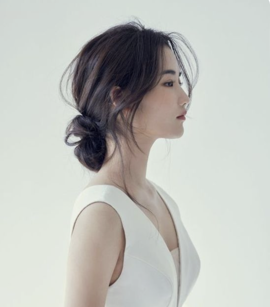43 Trendy Asian Hairstyles for Women 7 Messy updo with loose curls