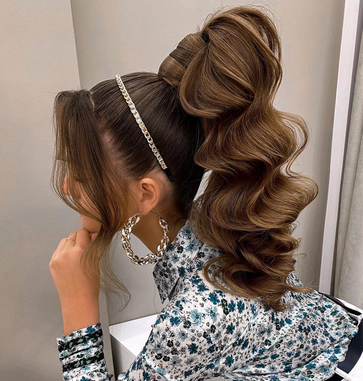 Voluminous Waves with Curtain Bangs and a Headband