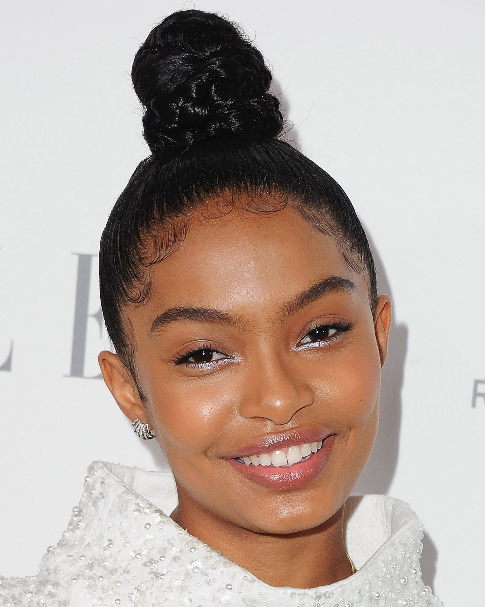 40 Top-Knot Hairstyles That Will Keep You Looking Fabulous All Day Long 1 A Sleek Braided Top-Knot