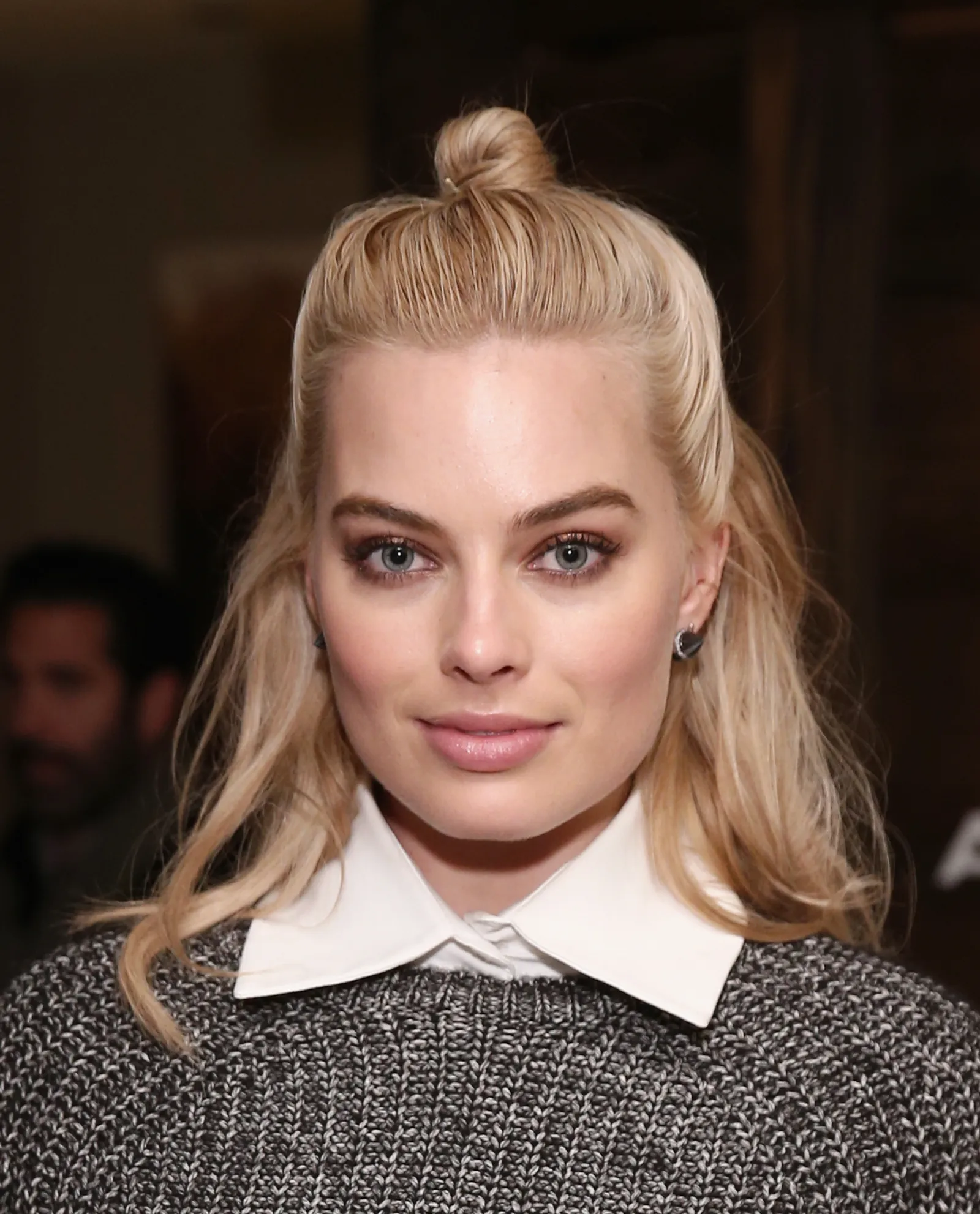 Slicked-back Top Knot with a Half-up Hairstyle
