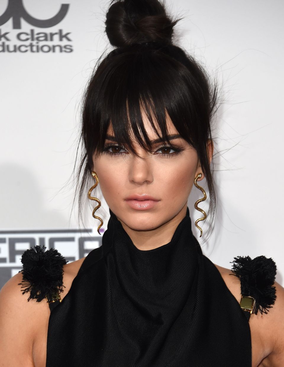 A Top-Knot with Razored-Bangs