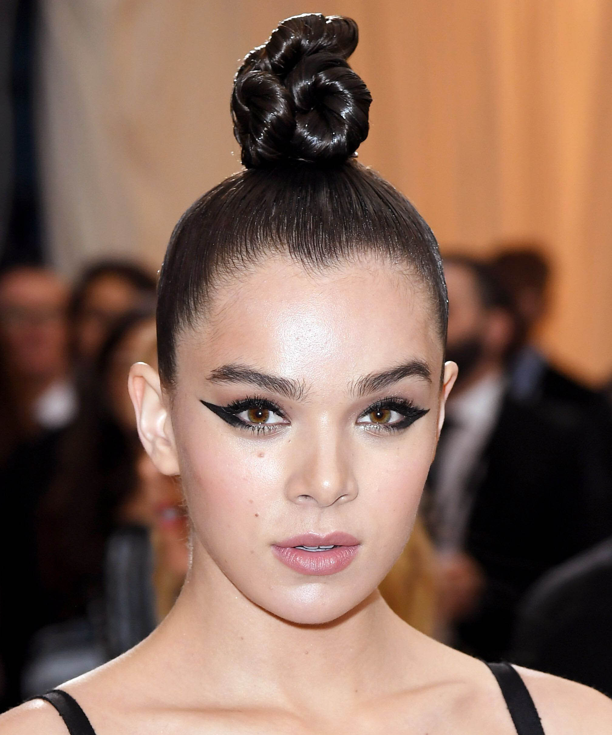Twisted-in and Wet-Look Top-Knot Hairstyle