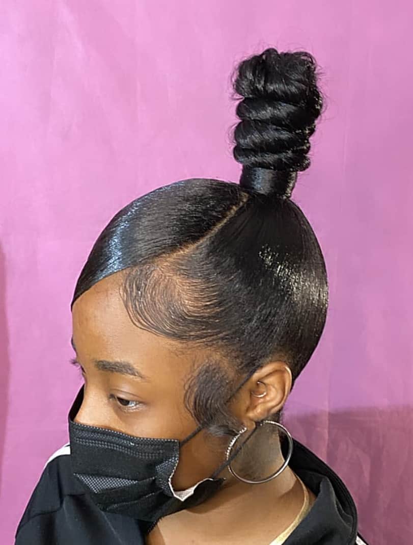 Gelled-up, Long Top-Knot with Bangs Swept to the Side