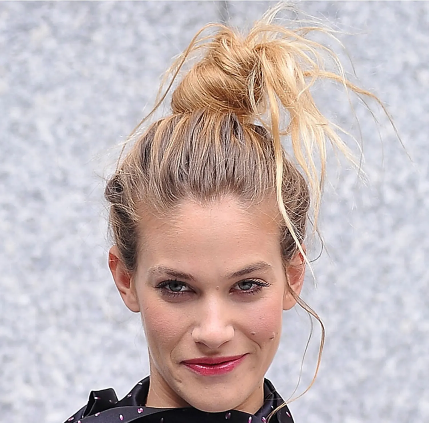 A Messy Top-Knot Hairstyle