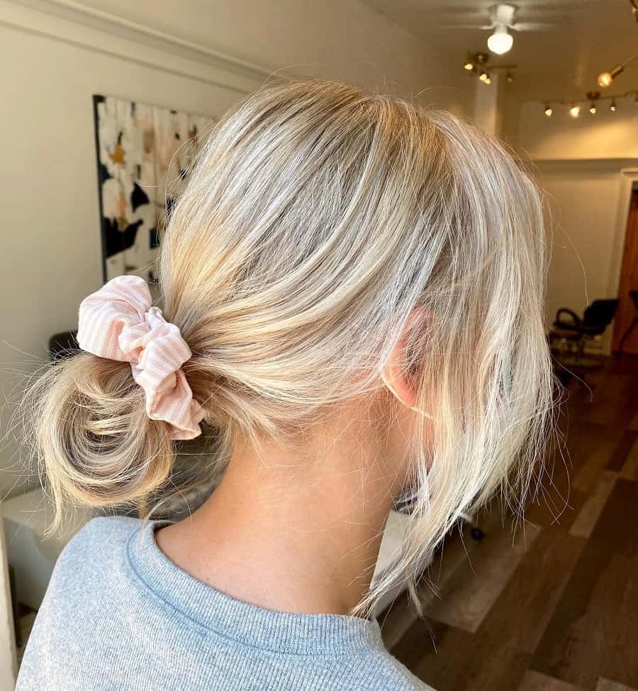 A Messy Low Knotted-Bun with a Scrunchie