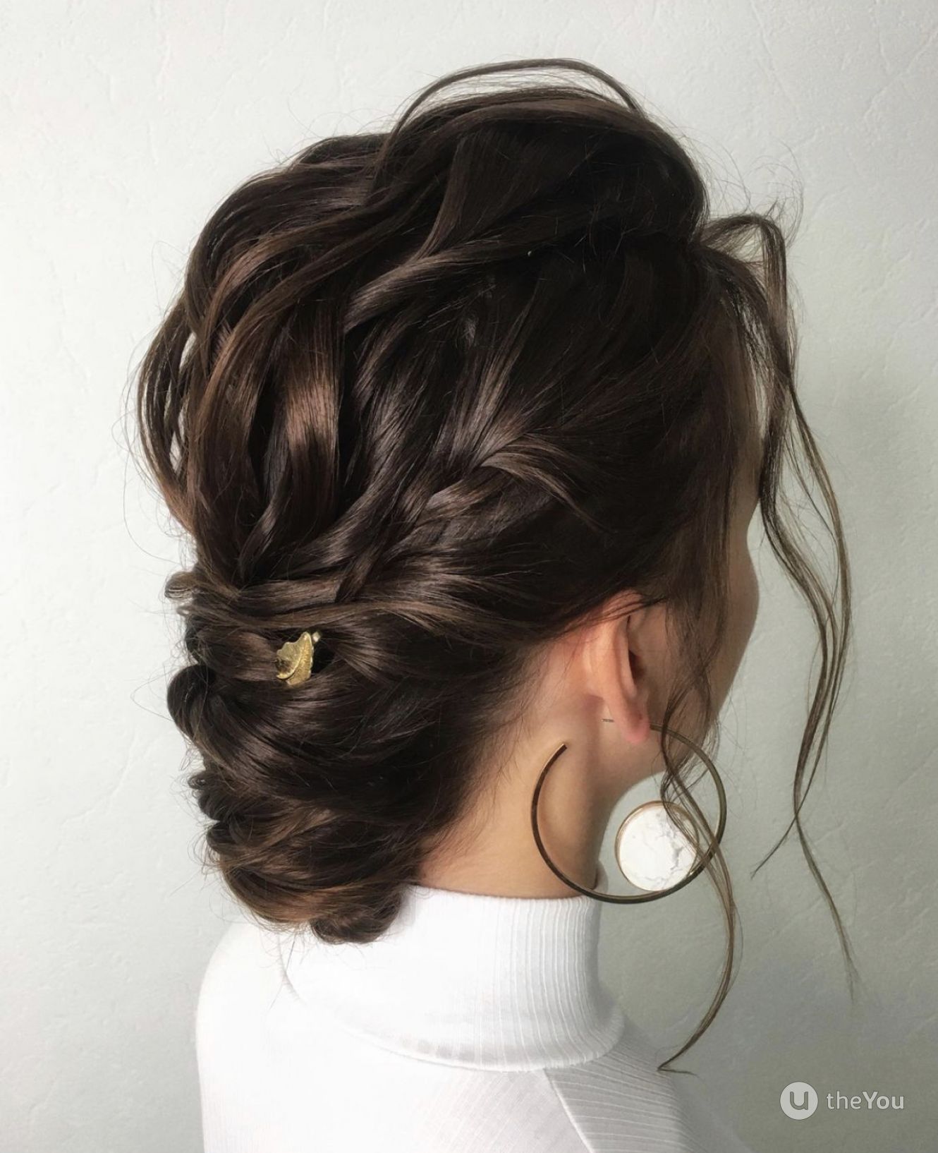 Messy and Low Tucked-in Updo