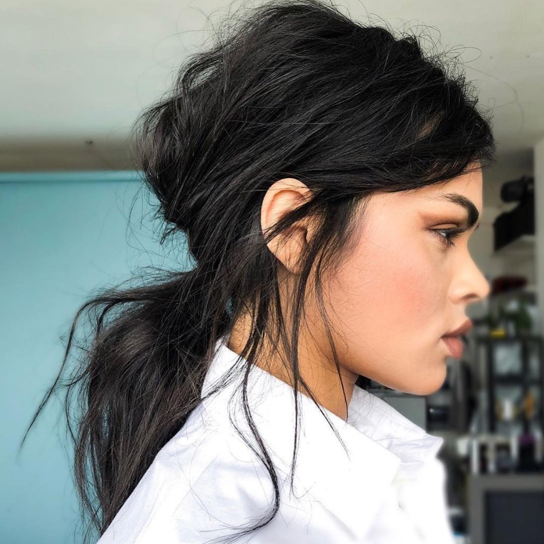 Voluminous and Messy Low Ponytail