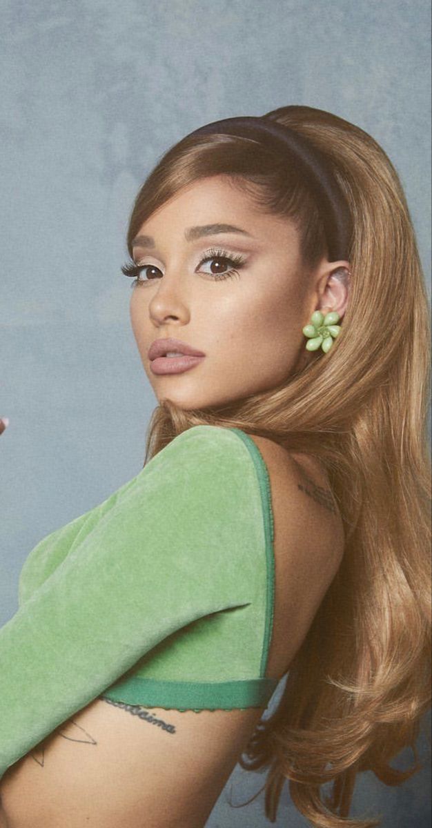 Half-up, Half-down Hairstyle with Sleek Bangs Swept to the Side