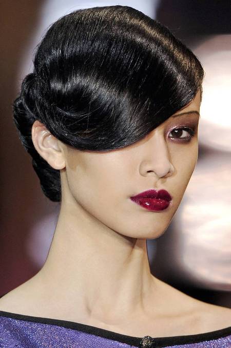 Retro Sleek and Deep Side-swept Updo