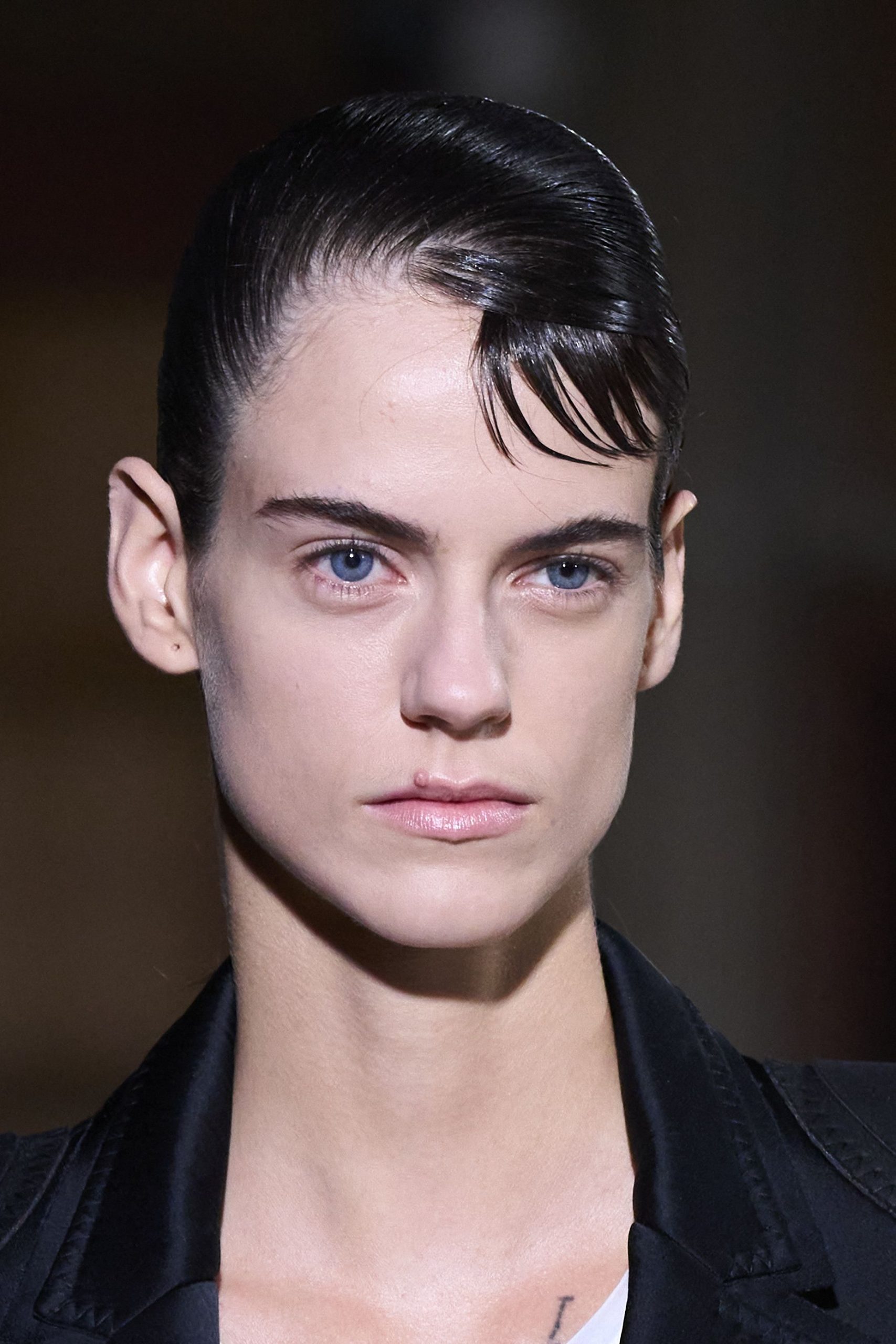 Sleek Rolled-up Pixie with Razored Bangs to the Side