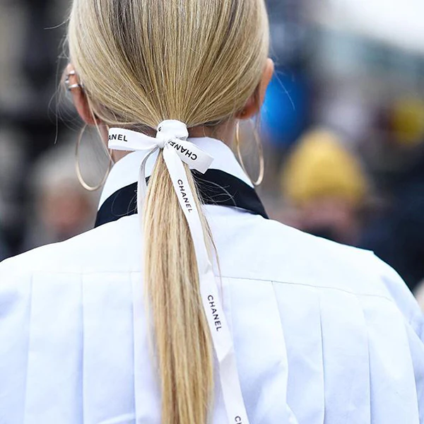 Slicked-back Low Ponytail Tied with a Ribbon