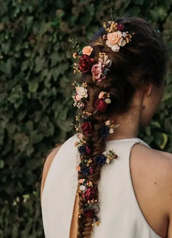 Boho messy fishtail braid with flowers