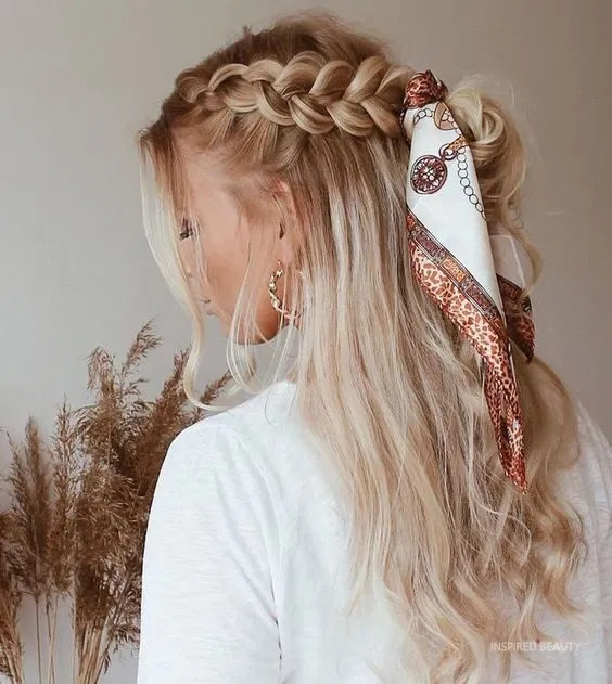 Half-up braided hairstyle with a scarf
