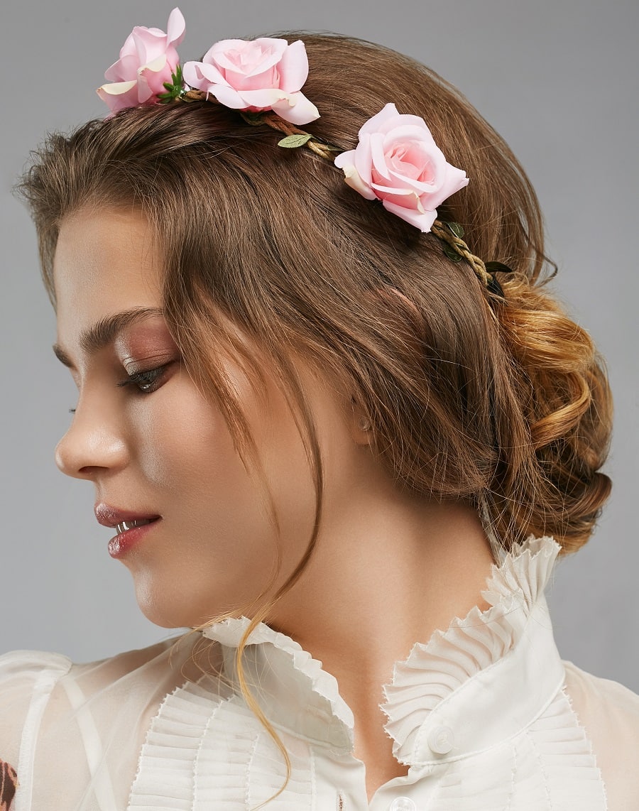 Messy bun with a floral <yoastmark class=