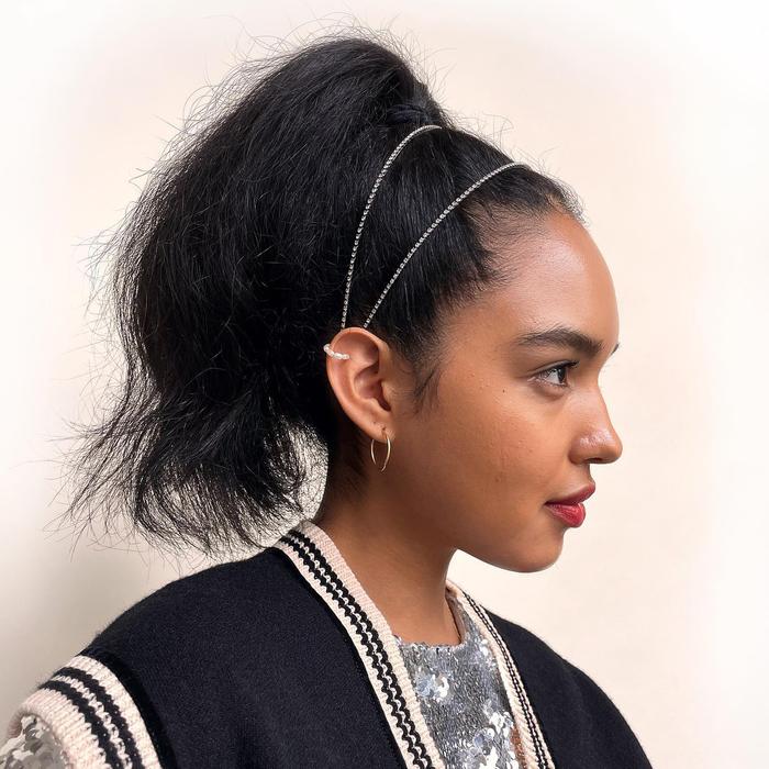 Sleek high ponytail with a metallic <yoastmark class=
