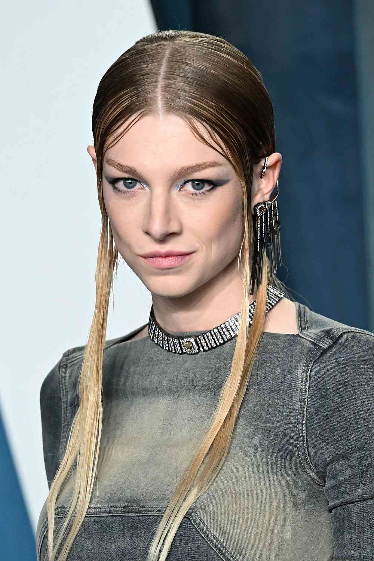 Sleek Center Part with Slicked-Back Hair